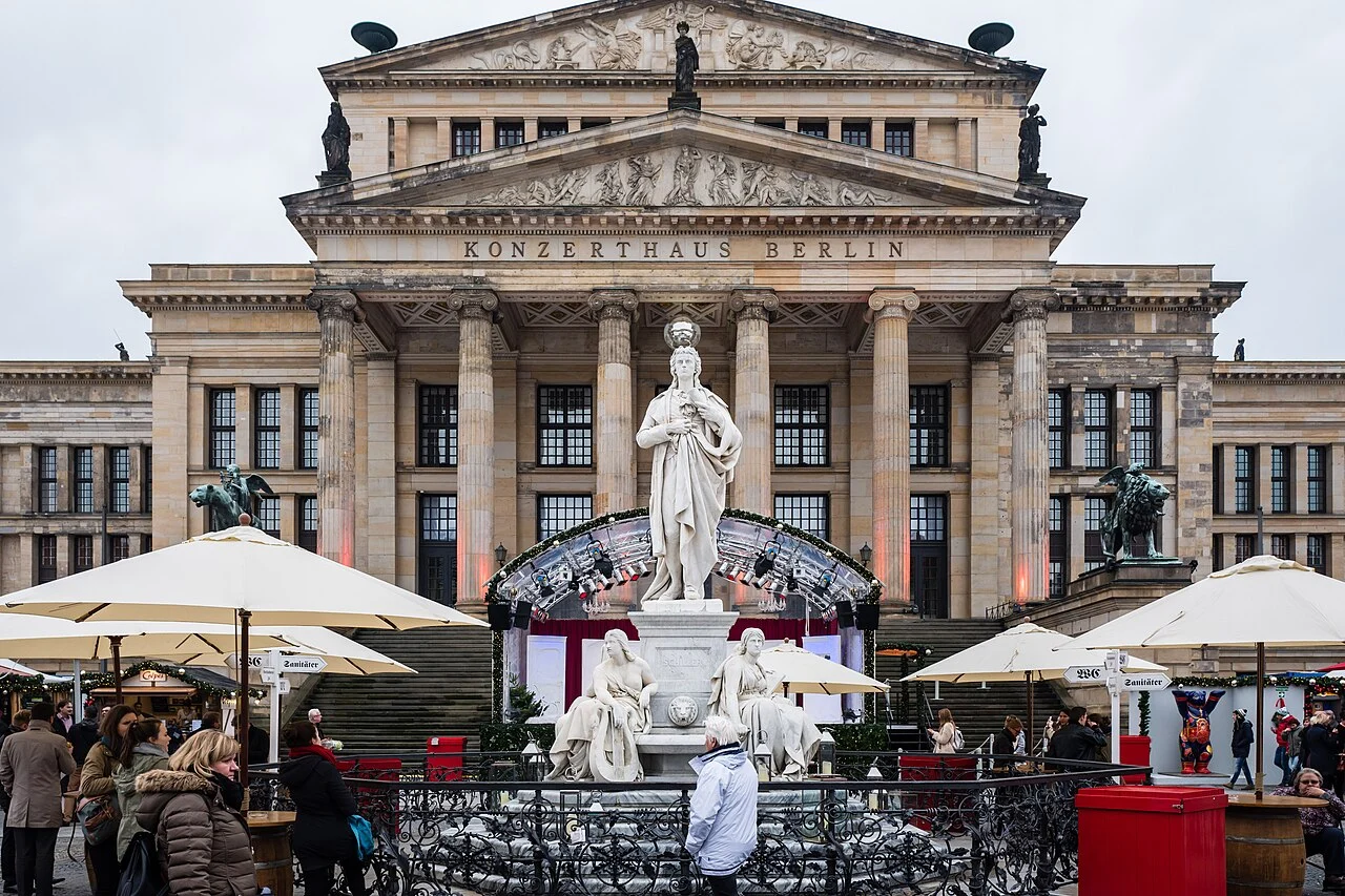Berlin's Konzerthaus and Gendarmenmarkt Christmas market in daylight; archival photograph